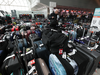 A man searches through baggage at Pearson International airport.