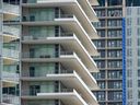 Balconies on condominiums in Buraby, B.C. The condo market has slowed in Canada.