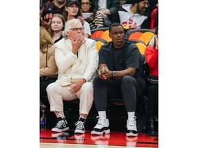 The king of buckets, KFC's Colonel Sanders, sits courtside with one of the world's premier shooters - Lethal Shooter celebrating buckets with Finger Lickin' Good Cellies to kick off upcoming Open Endorsement Campaign.