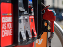 U.S. oil and agriculture lobbies are fighting together to get the limit on ethanol allowed in gasoline raised as an answer to the threat posed by electric vehicles to gasoline consumption.