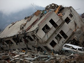 A building destroyed by the massive earthquake and tsunami in Onagawa, Japan in March, 2011. Canada is vulnerable to such a massive disaster, says the head of the Office of the Superintendent of Financial Institutions.