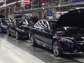 FILE - The redesigned Mercedes-Benz C-Class sedan reaches its final assembly stage the auto maker's plant, Sept. 5, 2014, in Vance, Ala. The United Auto Workers said Tuesday, Feb. 27, 2024, that a majority of workers at the Mercedes plant near Tuscaloosa, Ala., have signed cards in support of joining the union.