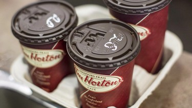 Cups of coffee on the counter at a Tim Hortons outlet in Oakville, Ont.