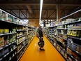 A shopper browses products at a Loblaw Cos. Ltd. grocery store in Toronto.
