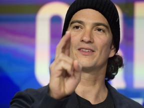 FILE - Adam Neumann, co-founder and CEO of WeWork, attends the opening bell ceremony at Nasdaq, Jan. 16, 2018, in New York. Neumann, the ousted co-founder of WeWork, is now exploring an deal to buy back the office sharing company after expressing dismay over its bankruptcy process. In a Monday, Feb. 5, 2024 letter obtained by The Associated Press, an attorney representing Neumann and Flow Global Holdings said that WeWork's former CEO had partnered up with capital sources like Dan Loeb's Third Point and are ready to submit a purchase proposal.