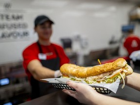 Restaurant Brands International inc. says it expects its quick-serve empire to span 40,000 restaurants achieving a collective US$60 billion in sales by 2028. Details from inside Firehouse Subs in Burlington, Ont. on Thursday, January 25, 2024.