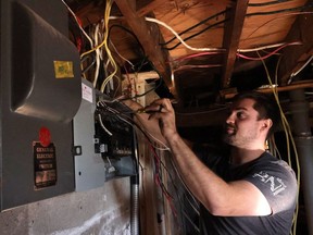 An electrician from Vancity Electric.