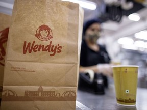 A bag of Wendy's food on a counter