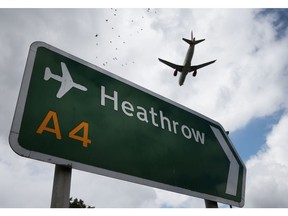An airplane comes in to land at Heathrow Airport in London. Photographer: Peter Macdiarmid/Getty Images
