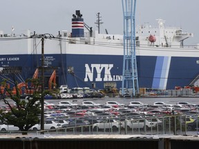 FILE - Cars for export park at a port in Yokohama, near Tokyo, on July 6, 2020.Japan's exports grew nearly 12% in January as shipments jumped in vehicles, auto parts and machinery, according to government data Wednesday, Feb. 21, 2024.