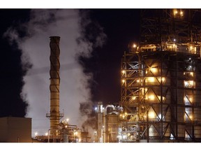 Emissions rise from the Royal Dutch Shell Plc Norco Refinery at night in Norco, Louisiana, U.S., on Thursday, Feb. 8, 2018. U.S. refiners exported staggering amounts of diesel and gasoline last year, hitting records in both categories while continuing to eye more opportunities to expand.
