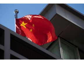 HOUSTON, TX - JULY 22: A Chinese national flag waves at the Chinese consulate after the United States ordered China to close its doors on July 22, 2020 in Houston, Texas. According to the State Department, the U.S. government ordered the closure of the Chinese consulate "in order to protect American intellectual property and Americans' private information."