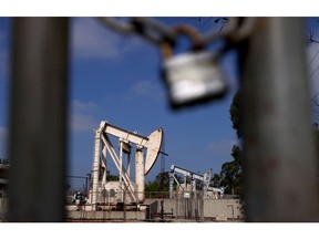 LONG BEACH, CALIFORNIA - NOVEMBER 02: Oil pumpjacks stand idle on November 02, 2021 in Long Beach, California. The Biden administration pledged to cut methane emissions from oil and gas production today. In California, 35,000 oil and gas wells sit idle, many of which are unplugged and could leak methane gas. Scientists estimate that one-third of human-induced global warming is caused by methane.