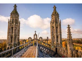 Solar panels during installation on the roof of King's College Chapel. Photographer: Jose Sarmento Matos/Bloomberg