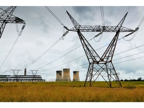 Electricity pylons near Eskom Holdings Hendrina coal-powered power station in Middelburg, South Africa.