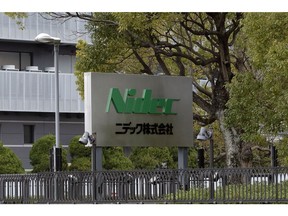 Signage outside the Nidec Corp. headquarters in Kyoto, Japan, on Wednesday, Feb. 14, 2024. Nidec promoted Executive Vice President Mitsuya Kishida to president and chief executive officer to lead the company's nascent push into EV motors. Photographer: Buddhika Weerasinghe/Bloomberg