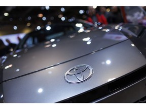 A Toyota badge on the hood of a car. Photographer: Cole Burston/Bloomberg