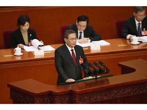 Li Qiang speaks during the 14th National People's Congress in Beijing on March 5.