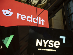 Reddit Inc. signage is seen on the New York Stock Exchange trading floor