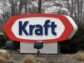 FILE - This March 25, 2015, file photo shows the Kraft logo in Northfield, Ill. The Biden administration announced $6 billion in funding Monday, March 25, 2024, for projects that will slash emissions from the industrial sector -- the largest-ever U.S. investment to decarbonize domestic industry to fight climate change. Kraft Heinz will install heat pumps, electric heaters and electric boilers to decarbonize food production at numerous facilities.