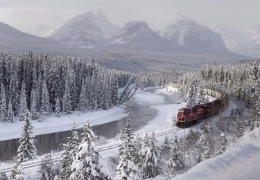 A Canadian Pacific railway locomotive pulls train cars along a rail line in Banff. If and when the hydrogen-powered train gets built, the line would track within the existing freight rail corridor.