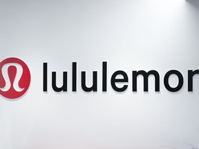 The Lululemon logo is seen on a wall at the company's headquarters, in Vancouver, on Thursday, May 25, 2023.