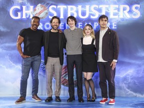 Ernie Hudson, from left, Paul Rudd, Finn Wolfhard, McKenna Grace and director Gil Kenan pose for photographers at the photo call for the film 'Ghostbusters: Frozen Empire Photo Call' on Thursday, March 21, 2024 in London.