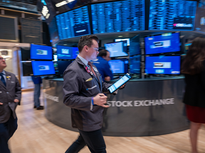 Traders work on the floor of the New York Stock Exchange (NYSE) on March 20, 2024 in New York City.