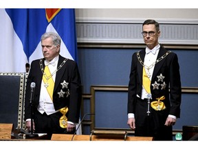 Alexander Stubb, right, takes over as president from Sauli Niinisto in Helsinki on March 1. Photographer: Heikki Saukkomaa/AFP/Getty Images