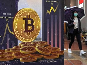 An advertisement for Bitcoin cryptocurrency displayed on a street in Hong Kong.