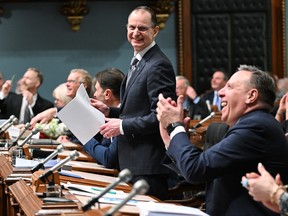 Quebec Finance Minister Eric Girard pauses as he presents his provincial budget, at the legislature in Quebec City.