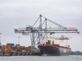 A container ship is loaded in the Port of Montreal.