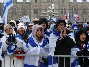 Demonstrators gather in support of the Jewish community on Parliament Hill in Ottawa.