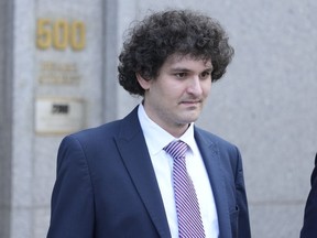 FILE - FTX founder Sam Bankman-Fried leaves Federal court, Wednesday, July 26, 2023, in New York. Prosecutors asked a New York judge on Friday, March 15, 2024 to sentence FTX founder Sam Bankman-Fried to between 40 and 50 years in prison for cryptocurrency crimes they described as a "historic fraud."