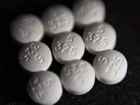 FILE - This Aug. 15, 2017 file photo shows an arrangement of pills of the opioid oxycodone-acetaminophen, also known as Percocet, in New York. Ohio is ready to begin distributing millions of dollars in opioid settlement money to community and government organizations, an influx eagerly anticipated since the first sums were secured in 2021. The OneOhio Recovery Foundation, which has been tasked with distributing over $860 million of settlements reached with drugmakers and pharmaceutical companies for their roles in the national opioid crisis, plans to release its formal request for proposals Monday, March 4, 2024.