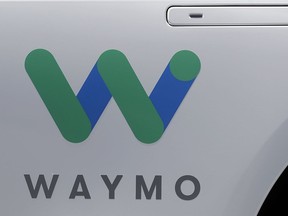 FILE - In this May 8, 2018, file photo, a Waymo logo is displayed on the door of a car at the Google I/O conference in Mountain View, Calif. Robotaxis are hitting the streets of Los Angeles. Google spinoff Waymo says on Thursday, March 14, 2024 it will begin offering free rides to a some of the roughly 50,000 people who have signed up for its driverless ride-hailing service in the second largest U.S. city.
