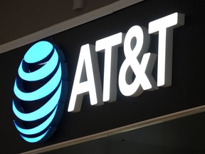 FILE - An AT&T sign is seen at a store in Pittsburgh, Monday, Jan. 30, 2023. AT&T said, Saturday, March 30, 2024, it has begun notifying millions of customers about the theft of personal data recently discovered online.