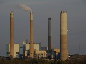 AES Indiana Petersburg Generating Station, a coal-fired power plant, operates in Petersburg, Ind., on Wednesday, Oct. 25, 2023.