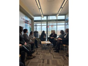 Pictured here, Nour Hachem-Fawaz, President of Build a Dream, and Melissa Young, Chief Executive Officer of Skilled Trades Ontario speaking with the new graduates of the Introduction to Millwrighting program delivered through a collaboration between the Millwright Regional Council and Build a Dream.
