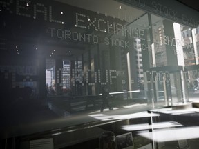Signage for the Toronto Stock Exchange (TSX) is seen in the financial district of Toronto on March 16, 2020.