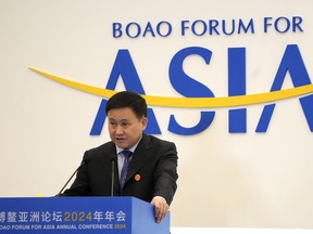 Pan Gongsheng, Governor of People's Bank of China, speaks at a sub forum ahead of the annual Boao Forum held in Boao in southern China's Hainan province on Wednesday, March 27, 2024. China's central bank governor calls for accleration of reforms on quta allocation at IMF to increase the voice of Asia