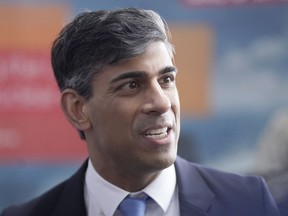 Britain's Prime Minister Rishi Sunak attends a visit to an engineering firm in Barrow-in-Furness, England, Monday, March 25, 2024.