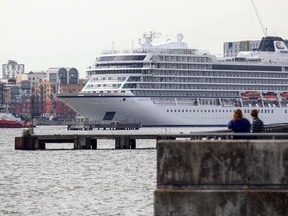 The Viking Sea, an ocean-going cruise ship, passes along the River Thames in London.