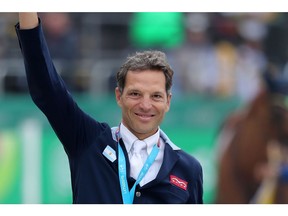 Jose Larocca on the podium following an equestrian jumping event in Peru in 2019.
