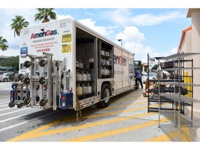 An AmeriGas Propane delivery truck sits parked outside a Home Depot Inc. store ahead of Hurricane Dorian in Oakland Park, Florida, U.S., on Thursday, Aug. 29, 2019. Hurricane Dorian is now expected to become a Category 4 storm, with winds reaching 130 miles per hour within 72 hours as it barrels toward Florida's east coast, aiming to become the first major hurricane to hit that area in 15 years.