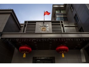 The Chinese flag is displayed in front of the Chinese Consulate General building in Houston, Texas on July 22.  Photographer: Scott Dalton/Bloomberg