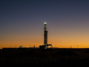 An oil drilling rig operates near Midland, Texas, U.S., on Saturday, Jan. 29, 2022. Temperatures are forecast to plummet across the oil and natural gas producing areas of Texas later this week, threatening to impact production and the power grid. Photographer: Matthew Busch/Bloomberg