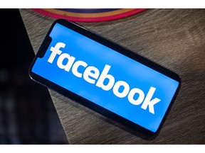 The Facebook logo on a smartphone arranged in Hastings-on-Hudson, New York, US, on Wednesday, Feb. 1, 2023. Meta Platforms Inc. is scheduled to release earnings figures on February 1.
