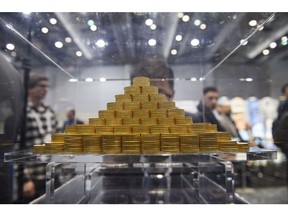 A display of gold coins during the Prospectors & Developers Association of Canada (PDAC) conference in Toronto, Ontario, Canada, on Monday, March 6, 2023. Thousands of executives, investors, bankers and government officials are converging on Toronto over six days to attend one of the world's largest industry conferences as project pipelines shrink and companies face pressure to buy growth.