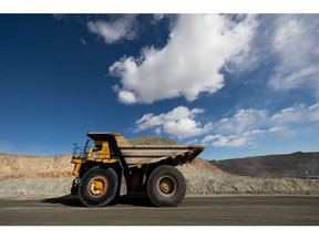 A dump truck carrying raw ore at the open pit mine at the Erdenet Mining Corp. copper mine in Erdenet, Mongolia, on Wednesday, March 15, 2023. Erdenet, the country's second-biggest copper mine, has been producing since 1978 when it was set up with support from the Soviet Union. Photographer: SeongJoon Cho/Bloomberg